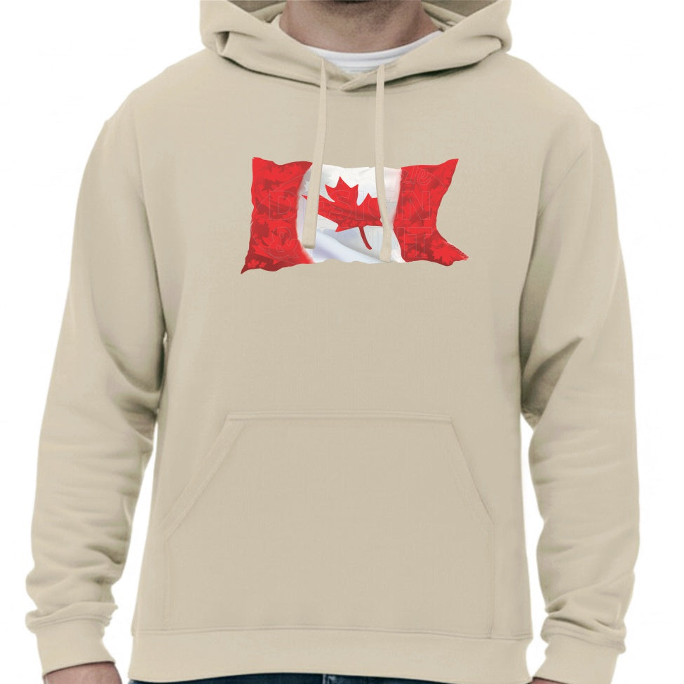 Super soft 12.5oz sand hoodie with A waving Canadian Flag made up of small red, white & light gray maple leaf designs