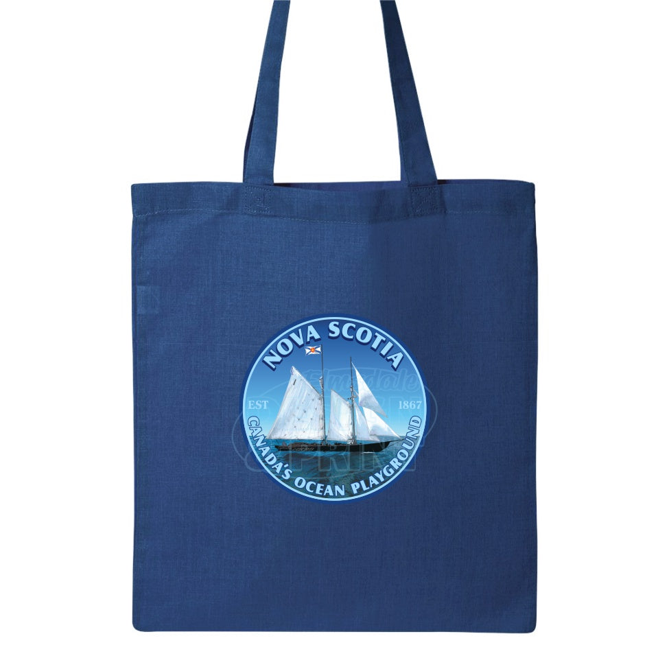 15x16" solid royal canvas tote bag with Sailing schooner with Nova Scotia & Canada’s Ocean Playground in a circular design