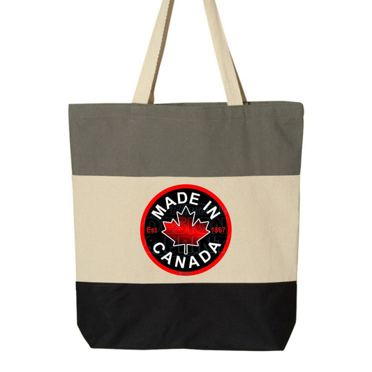 15x16" tri-color canvas tote bag with Circular design with Made in Canada & a centered bright red maple leaf & Est.1867