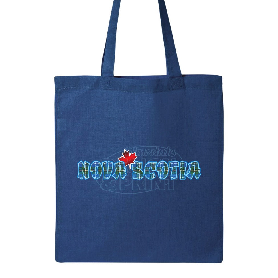 15x16" solid royal canvas tote bag with Nova Scotia written in Blue Tartan with a bright red Maple Leaf & bright blue outlines